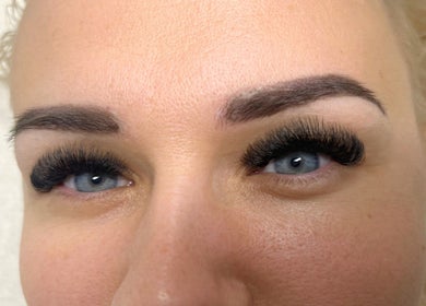 Close-up of eyelash extensions from Winked Studio, Toronto, Ontario, CA showcasing full, dramatic lashes.