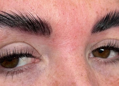Close-up of expertly styled eyebrows and lashes at Jessica Kelly, Huyton, England, GB.