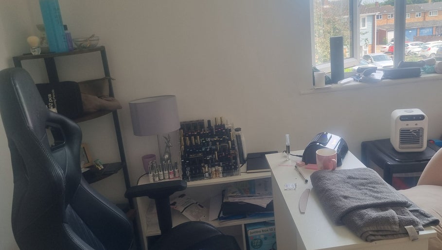 Welcoming beauty corner at 9 homemead cm2 8sn, Chelmsford, England, GB, featuring nail polish and a cozy chair.