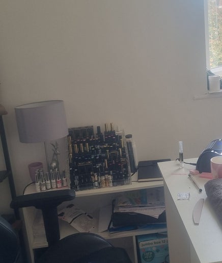 Welcoming beauty corner at 9 homemead cm2 8sn, Chelmsford, England, GB, featuring nail polish and a cozy chair.