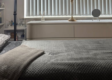 Cozy treatment room at Luminous Skin Clinic, Letterkenny, County Donegal, IE, with plush blankets and soft lighting.
