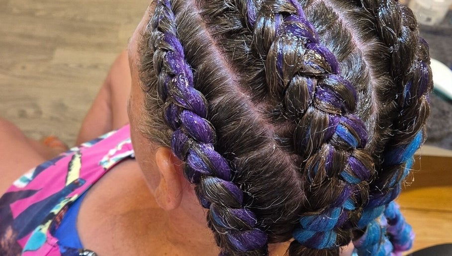 Colorful braided hairstyle at Power Of Women V Comp, Melbourne, Victoria, AU showcasing vibrant purple hues.