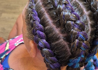 Colorful braided hairstyle at Power Of Women V Comp, Melbourne, Victoria, AU showcasing vibrant purple hues.