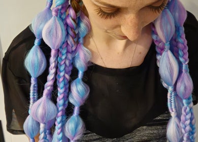 Colorful braided hairstyle at Power Of Women V Comp in Melbourne, Victoria, AU.