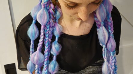 Colorful braided hairstyle at Power Of Women V Comp in Melbourne, Victoria, AU.