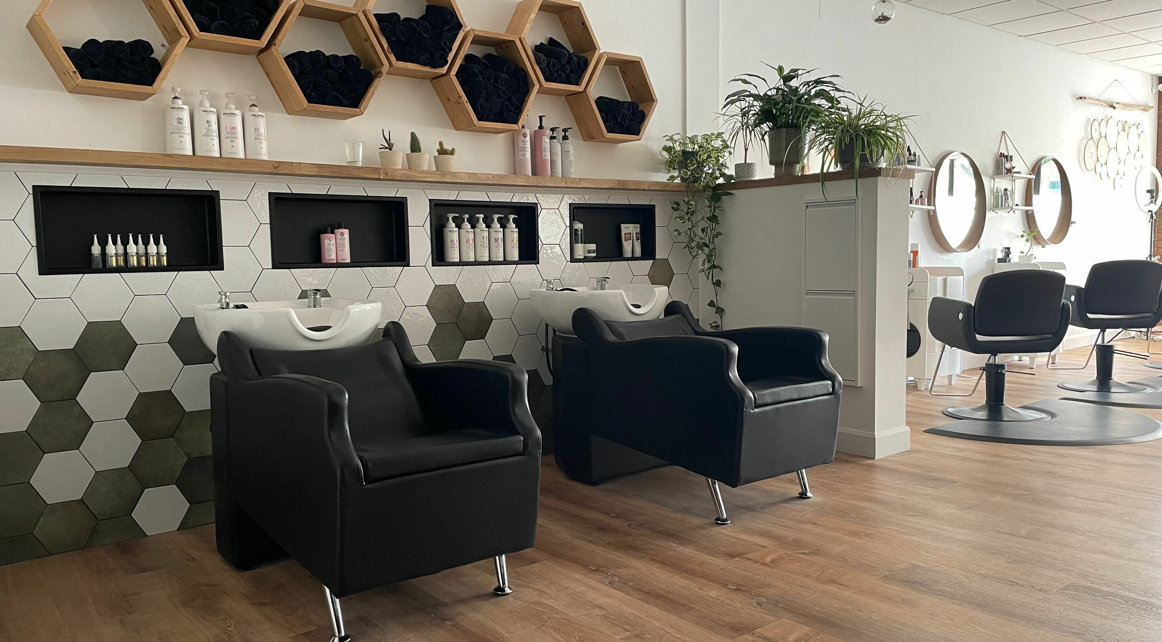 Modern salon interior at Terra Hair Lounge, stylish wash stations in Whitby, Ontario, CA.