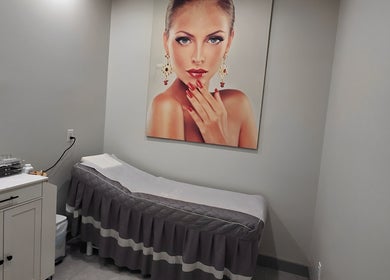 Calm treatment room at Mc Nails in Gibbons, Alberta, CA with modern decor and spa bed.