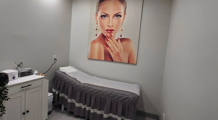 Calm treatment room at Mc Nails in Gibbons, Alberta, CA with modern decor and spa bed.