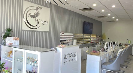 Modern interior of Mc Nails in Gibbons, Alberta, CA, featuring elegant nail salon setup with stylish decor.
