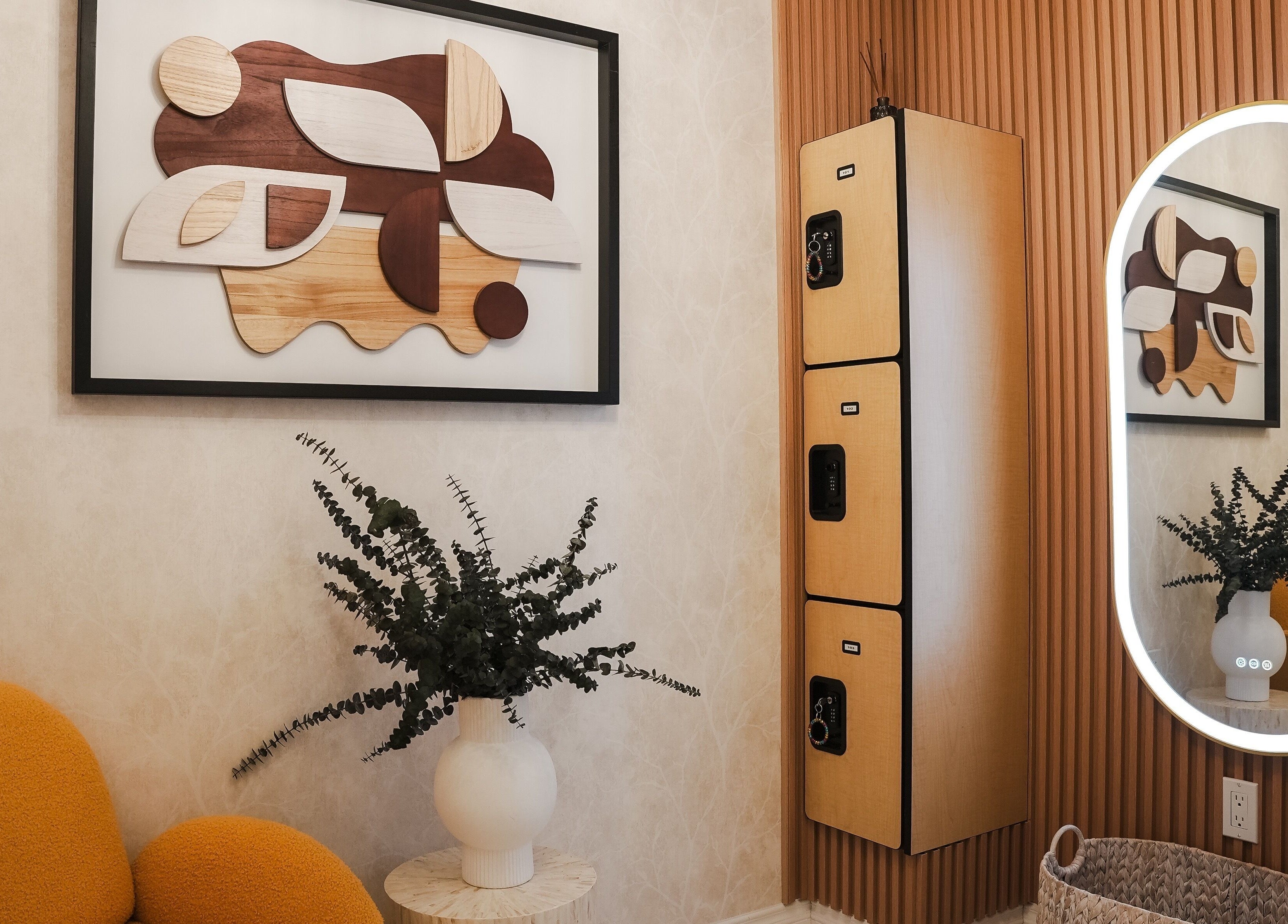 Modern waiting area at Lavie Bella Head Spa, Artesia, California, US, featuring art and comfortable seating.