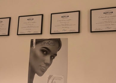 Certificates and skincare poster at Luxury Beauty By Liv, Louth, England, GB illustrate professional expertise.