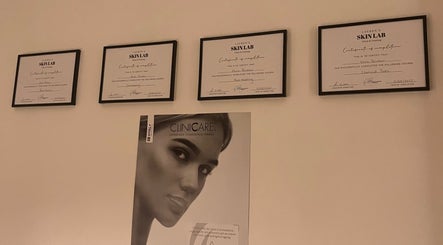 Framed certificates displayed at Luxury Beauty By Liv, Louth, England, GB, showcasing expertise in beauty services.
