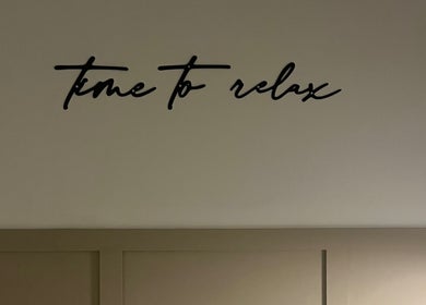 Calming 'Time to Relax' wall decor at Luxury Beauty By Liv, Louth, England, GB.
