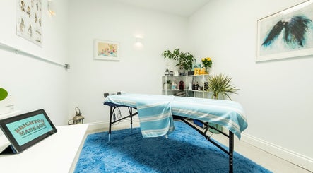 Brighton Massage room in Brighton And Hove, England features a serene setup with a massage table and soothing decor.