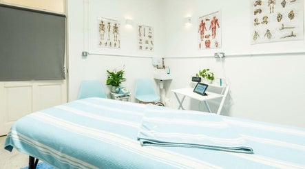 Brighton Massage tranquil room with massage bed and decor in Brighton And Hove, England, GB.