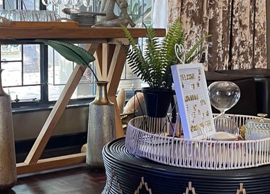Stylish interior decor at Konanani Massage & Spa, Polokwane, Limpopo, ZA, with vases and greenery.