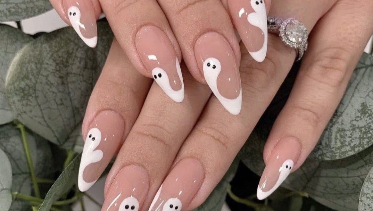 Chic ghost nail art at Pro Nails Salon, Winnipeg, Manitoba, CA. Perfect for a unique, stylish look.