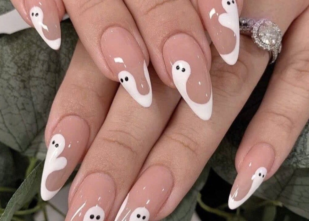 Chic ghost nail art at Pro Nails Salon, Winnipeg, Manitoba, CA. Perfect for a unique, stylish look.