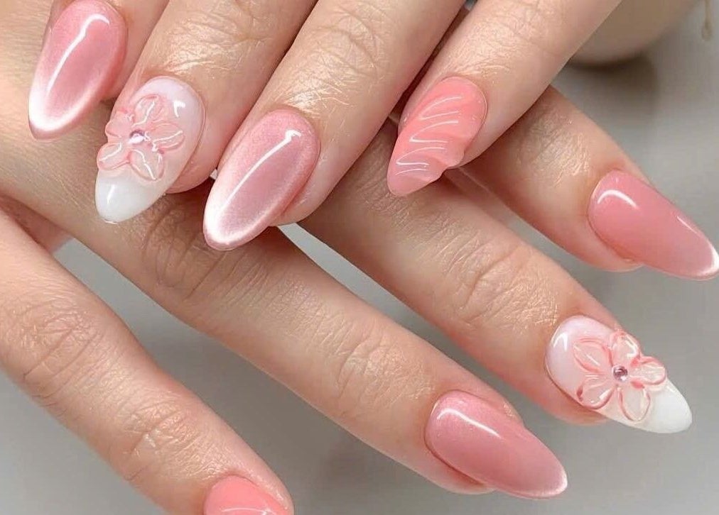 Beautiful pink floral nail art at Pro Nails Salon in Winnipeg, Manitoba, CA.