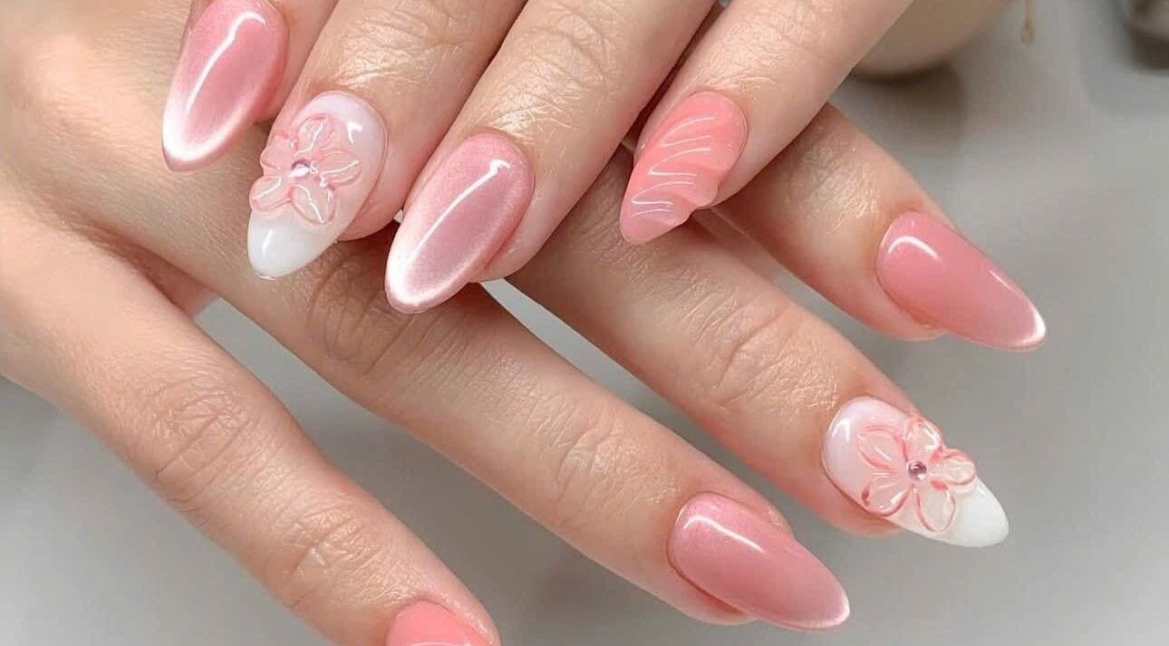 Beautiful pink floral nail art at Pro Nails Salon in Winnipeg, Manitoba, CA.
