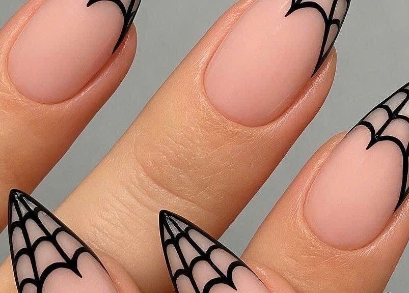 Intricate spider web nail art at Pro Nails Salon, Winnipeg, Manitoba, CA.