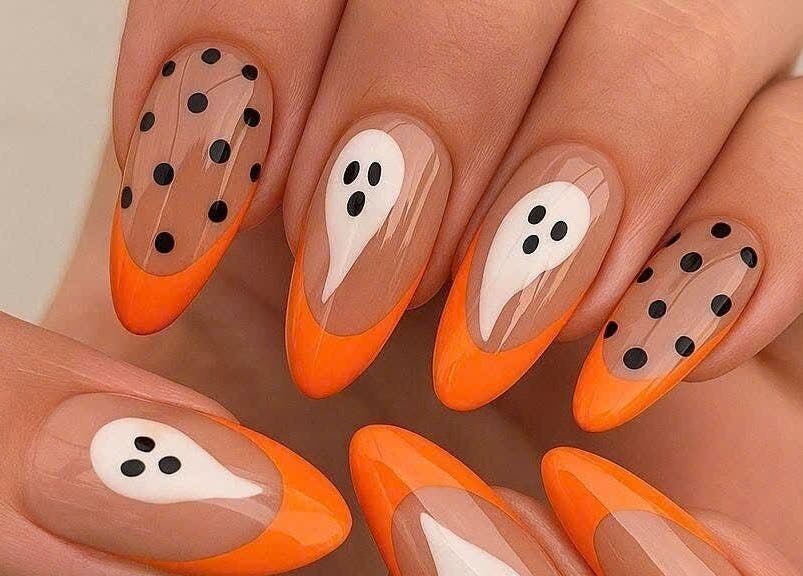 Spooky nail art with orange tips at Pro Nails Salon, Winnipeg, Manitoba, CA.