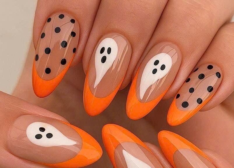 Spooky nail art with orange tips at Pro Nails Salon, Winnipeg, Manitoba, CA.