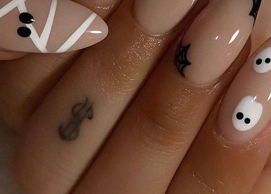 Creative Halloween nail art design at Pro Nails Salon, Winnipeg, Manitoba, CA.