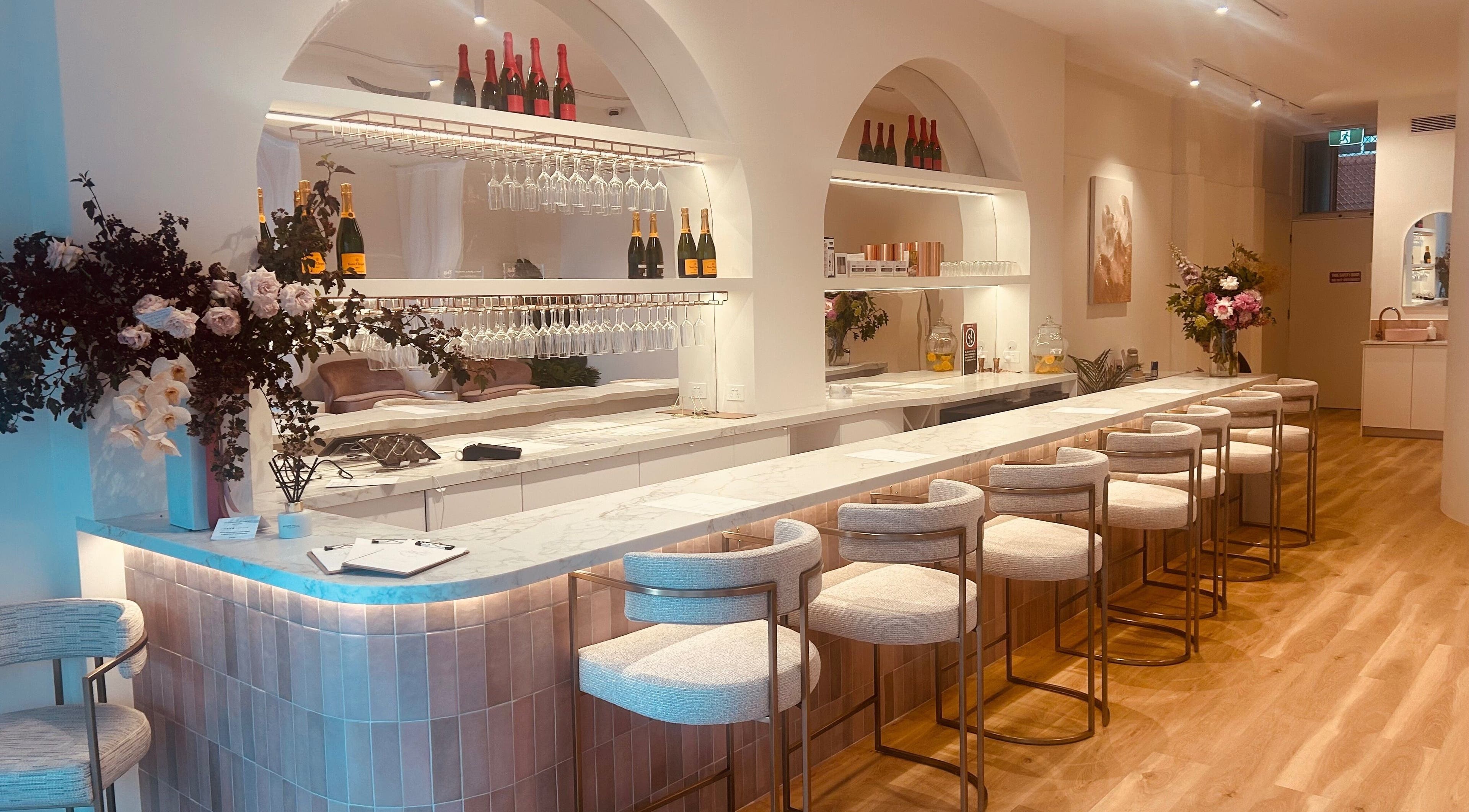 Elegant interior of Melt Nail Bar in Bronte, New South Wales, AU featuring a chic counter and stylish seating.