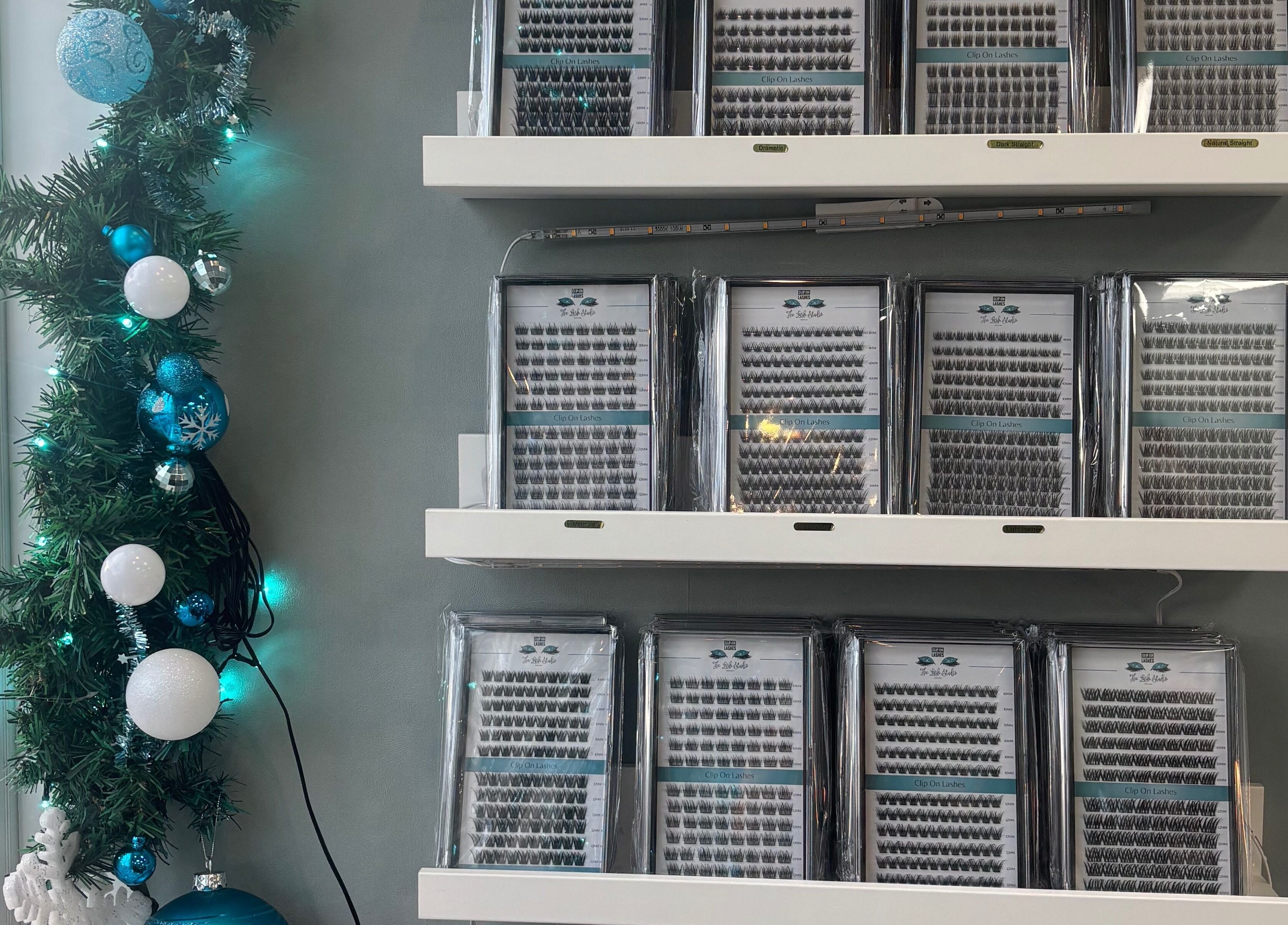 Festive lash extension display at The Lash Studio NE, Jarrow, England, GB with holiday decor.