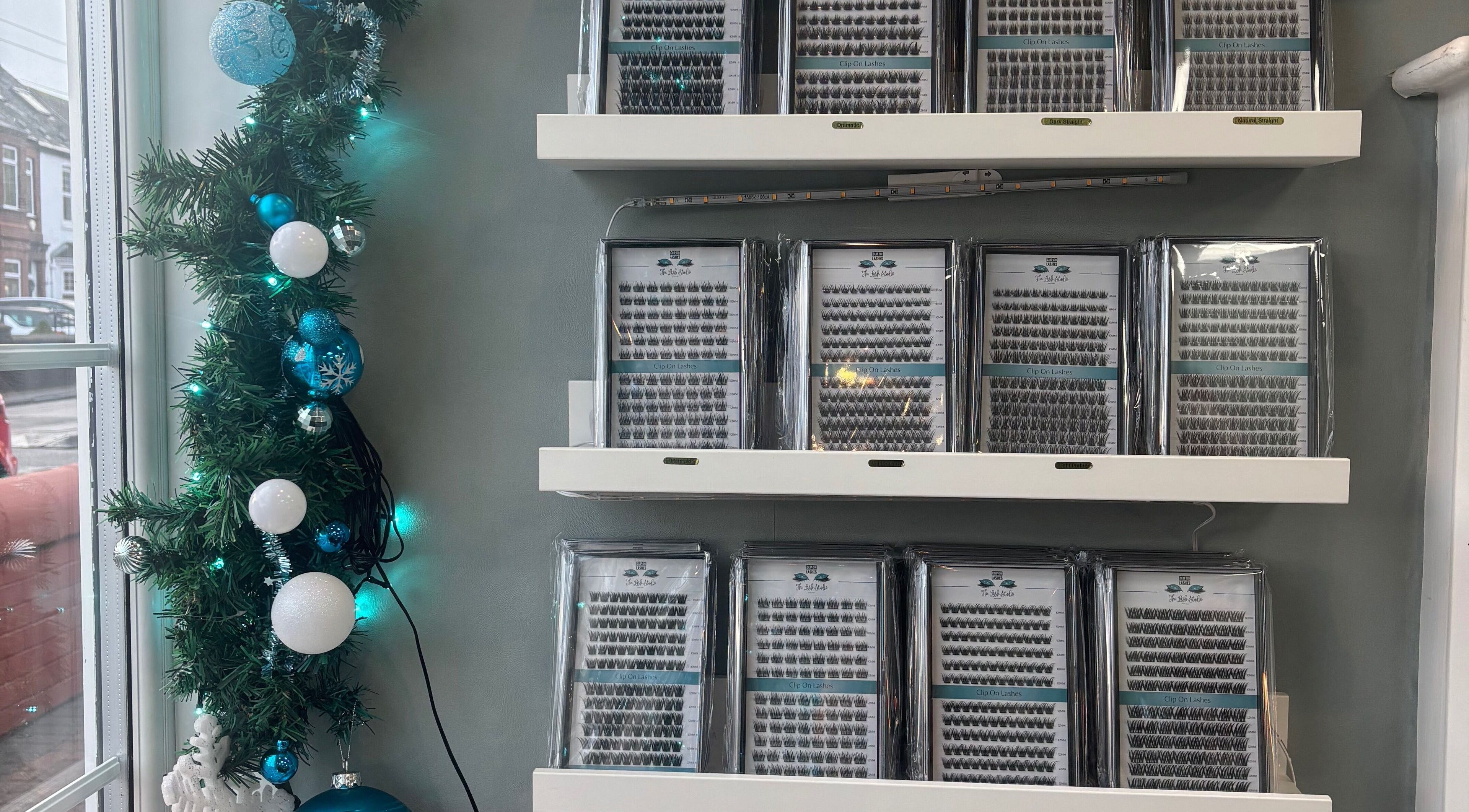 Festive lash extension display at The Lash Studio NE, Jarrow, England, GB with holiday decor.