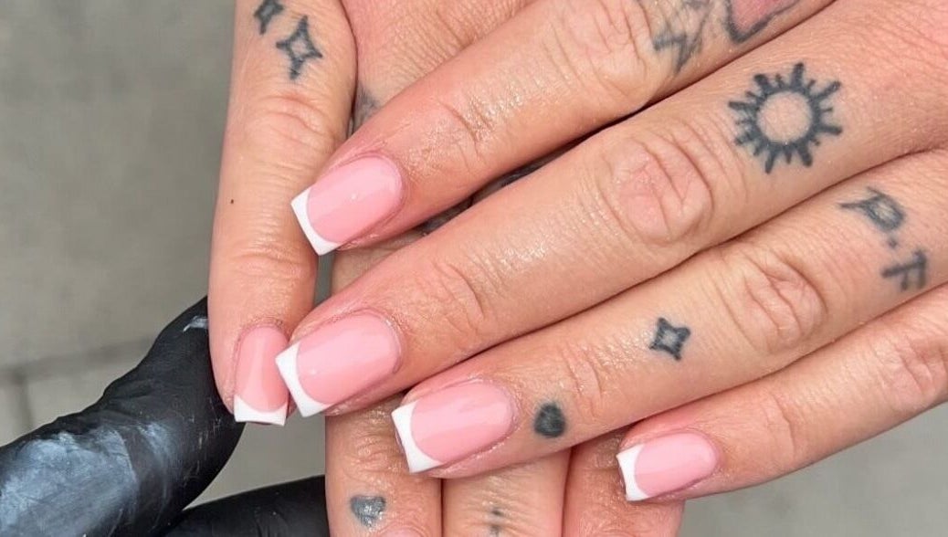 Elegant French manicure at Nails by jodie-lea, Eccles, England, GB with pink polish and white tips.
