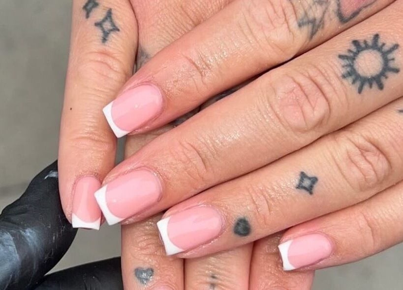 Elegant French manicure at Nails by jodie-lea, Eccles, England, GB with pink polish and white tips.