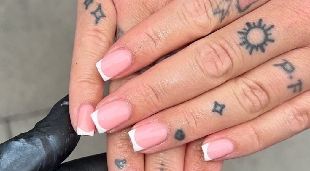Elegant French manicure at Nails by jodie-lea, Eccles, England, GB with pink polish and white tips.