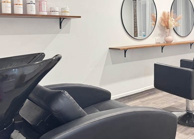 Modern chairs and mirrors at Brooke & Co Hair Salon, Ipswich, Queensland, AU.