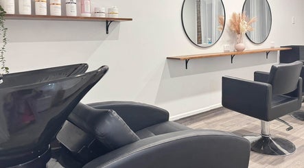 Modern chairs and mirrors at Brooke & Co Hair Salon, Ipswich, Queensland, AU.