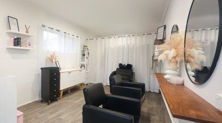 Chic interior of Brooke & Co Hair Salon in Ipswich, Queensland, AU with stylish chairs and decor.