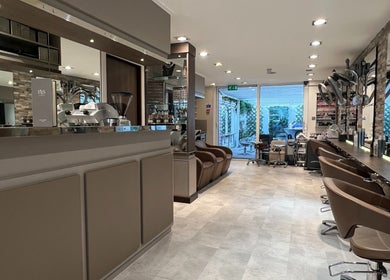 Interior of RYS Hair and Beauty in London, England, GB, showcasing modern salon design with a stylish ambiance.