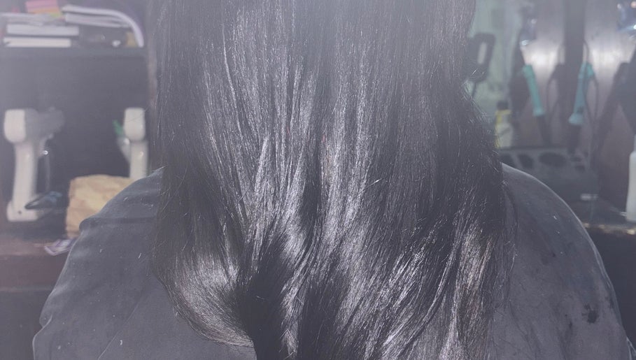 Smooth, shiny black hair styled at Hair Works by Allison in Princes Town, Princes Town Regional Corporation, TT.