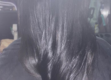 Smooth, shiny black hair styled at Hair Works by Allison in Princes Town, Princes Town Regional Corporation, TT.
