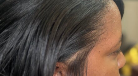 Close-up of sleek, glossy hairstyle at Hair Works by Allison, Princes Town, Princes Town Regional Corporation, TT.