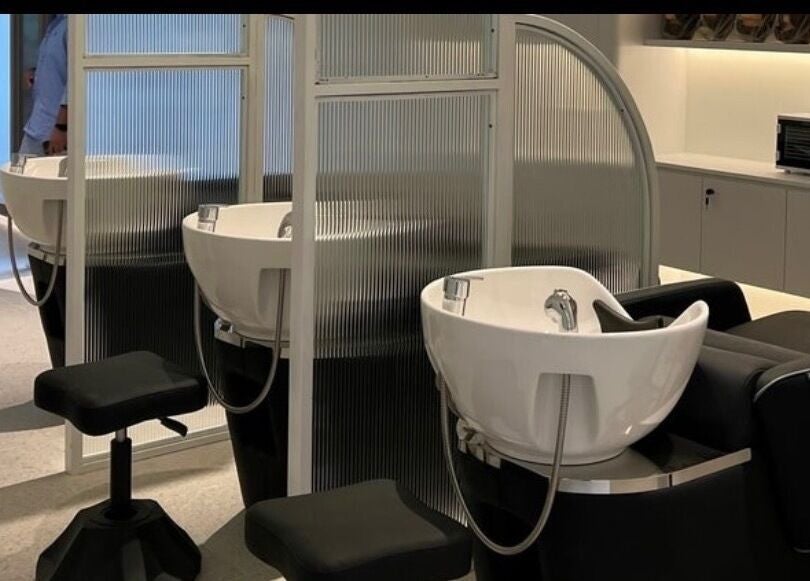 Modern washing station at Snip & Drip, Petaling Jaya, Selangor, MY offers comfort and elegance in hair care.