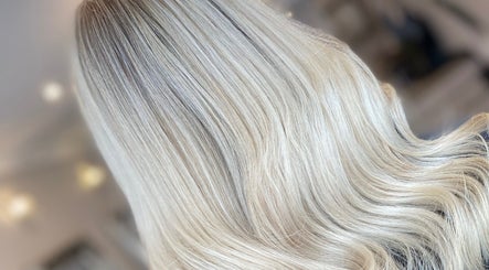 Blonde hair styled elegantly at JH Hair, Stalybridge, England, GB.