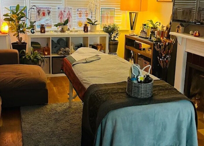 Peaceful massage room at Yupin Thai Massage in Brighton And Hove, England, GB with warm lighting and cozy decor.