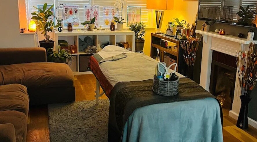 Peaceful massage room at Yupin Thai Massage in Brighton And Hove, England, GB with warm lighting and cozy decor.