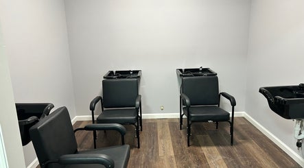 Modern wash stations at Lemon Sage Day Spa Salon in Scottsboro, Alabama, US highlighting sleek salon design.