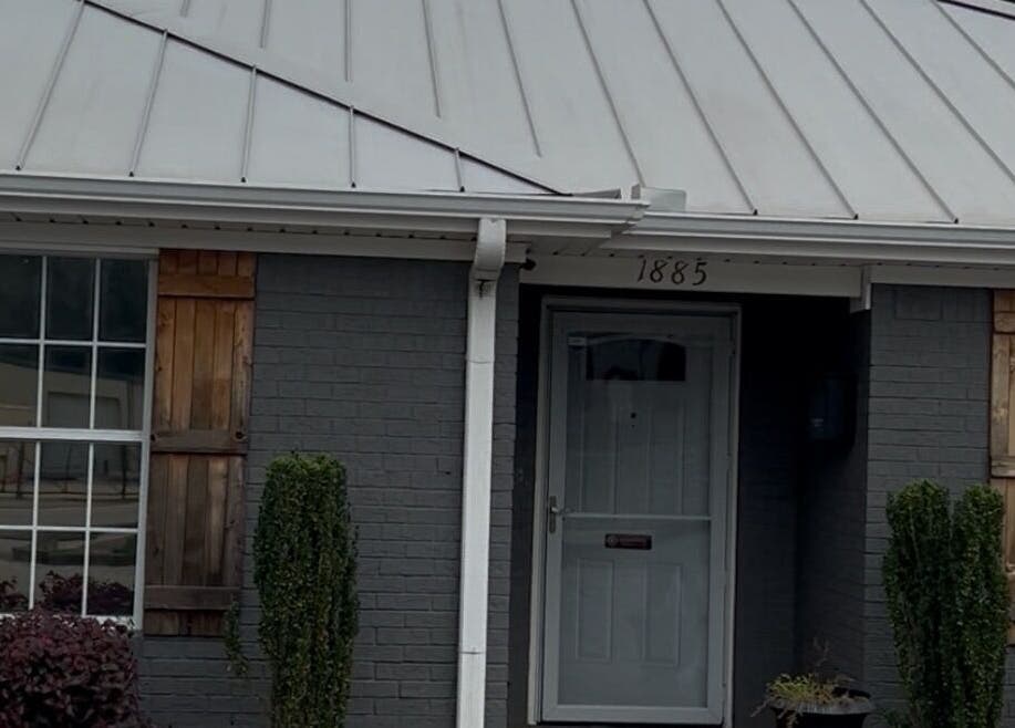 Front entrance of Ascend Beauty College Huntsville Campus with sleek design in Huntsville, Alabama, US.