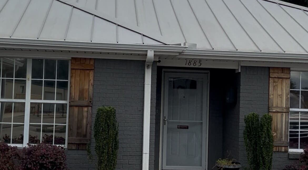 Front entrance of Ascend Beauty College Huntsville Campus with sleek design in Huntsville, Alabama, US.