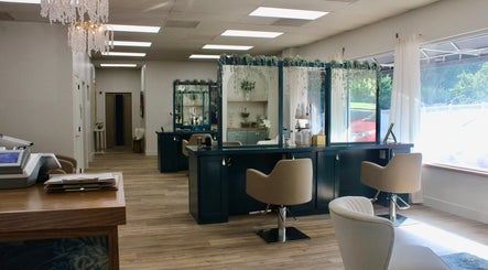 Chic salon interior at Restored Beauty Bar and Head Spa in Richmond, Virginia, US with modern decor and styling chairs.