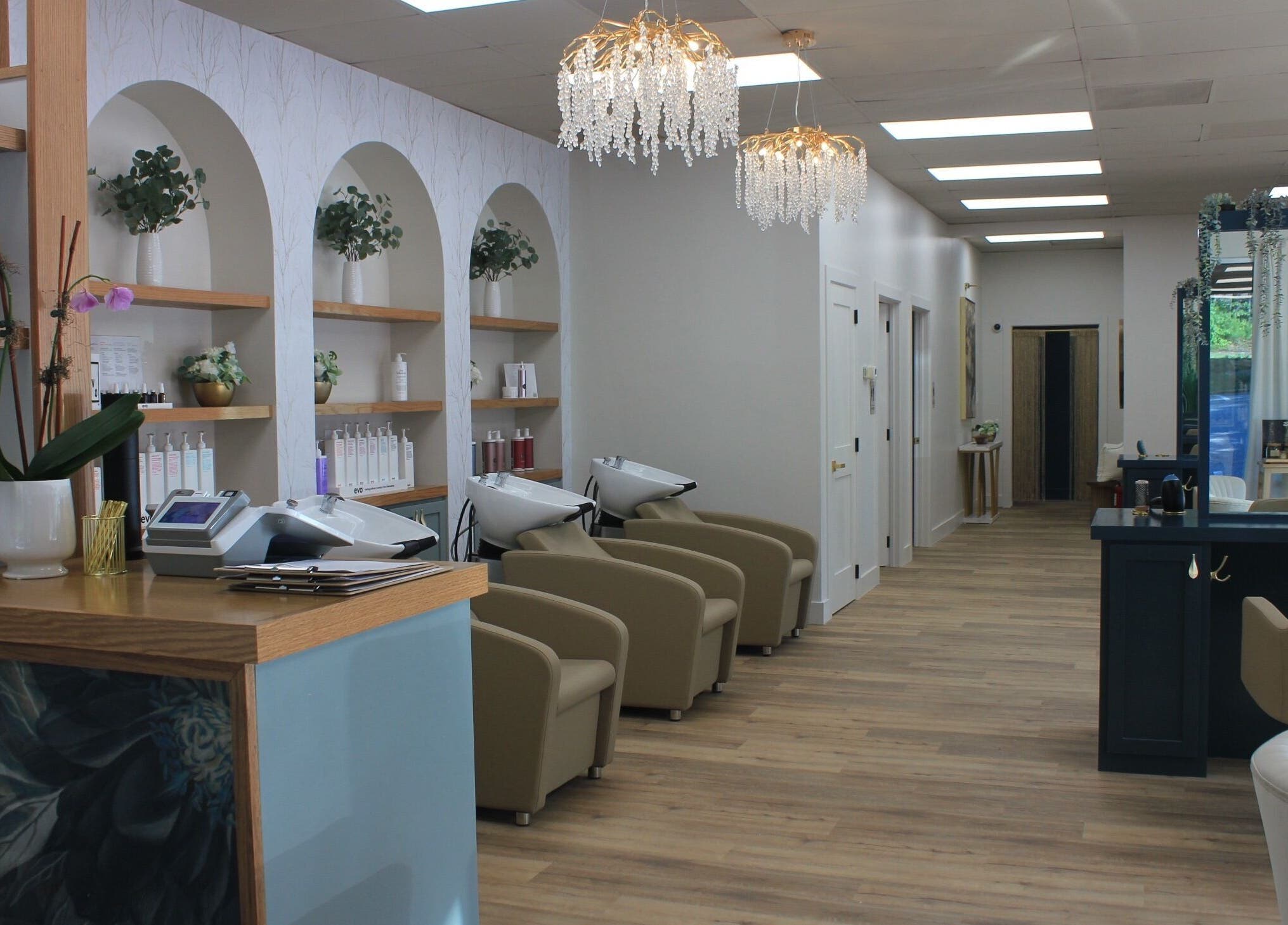 Chic interior of Restored Beauty Bar and Head Spa in Richmond, Virginia, US with modern decor and comfortable seating.